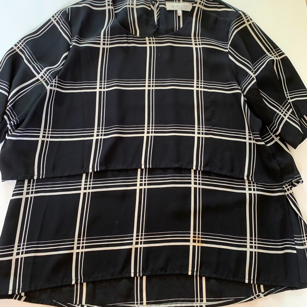 Tiered black and white buffalo check boxy blouse in silk